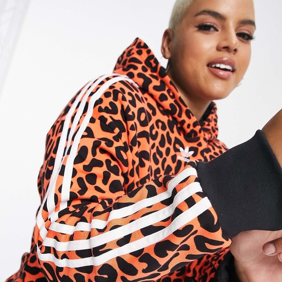 adidas Tops - adidas Originals x Rich Mnisi Plus all over leopard print hoodie in orange 1X